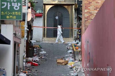 韩警方事发前接到11次报警仅出动4次 狂欢落幕谁